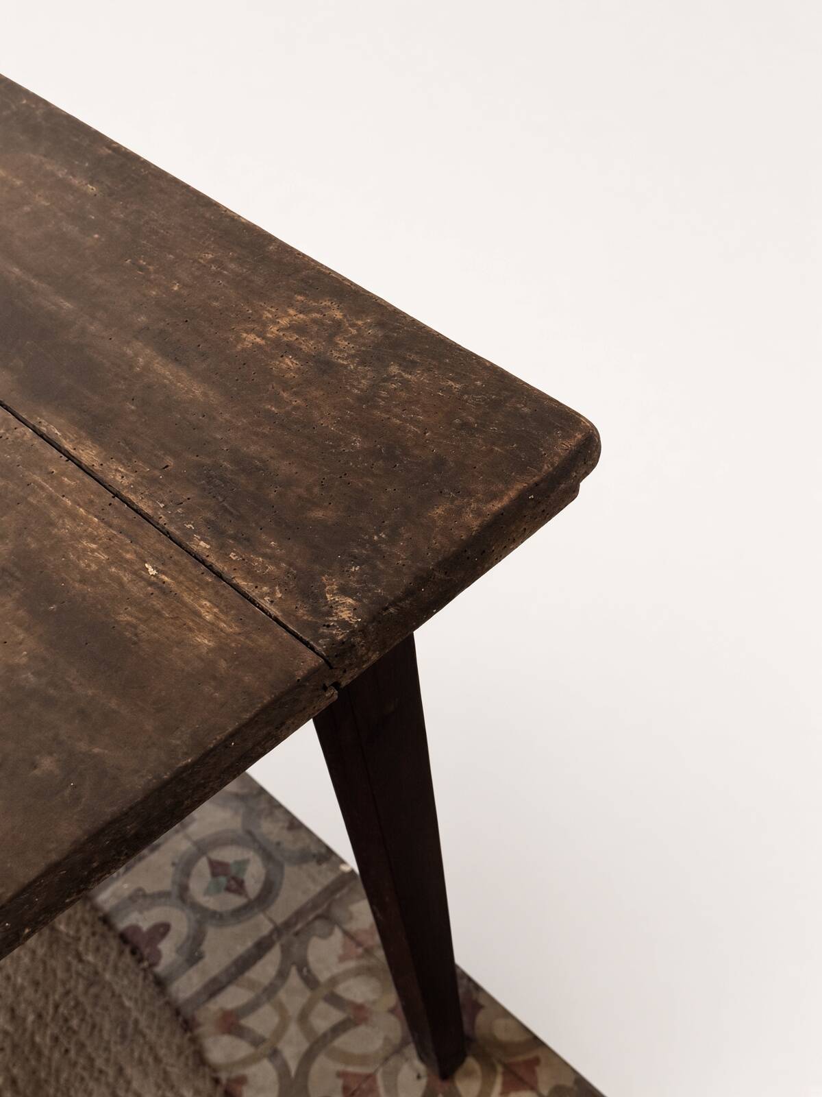 Narrow old wooden farmhouse table