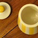 Yellow and white striped cover pot