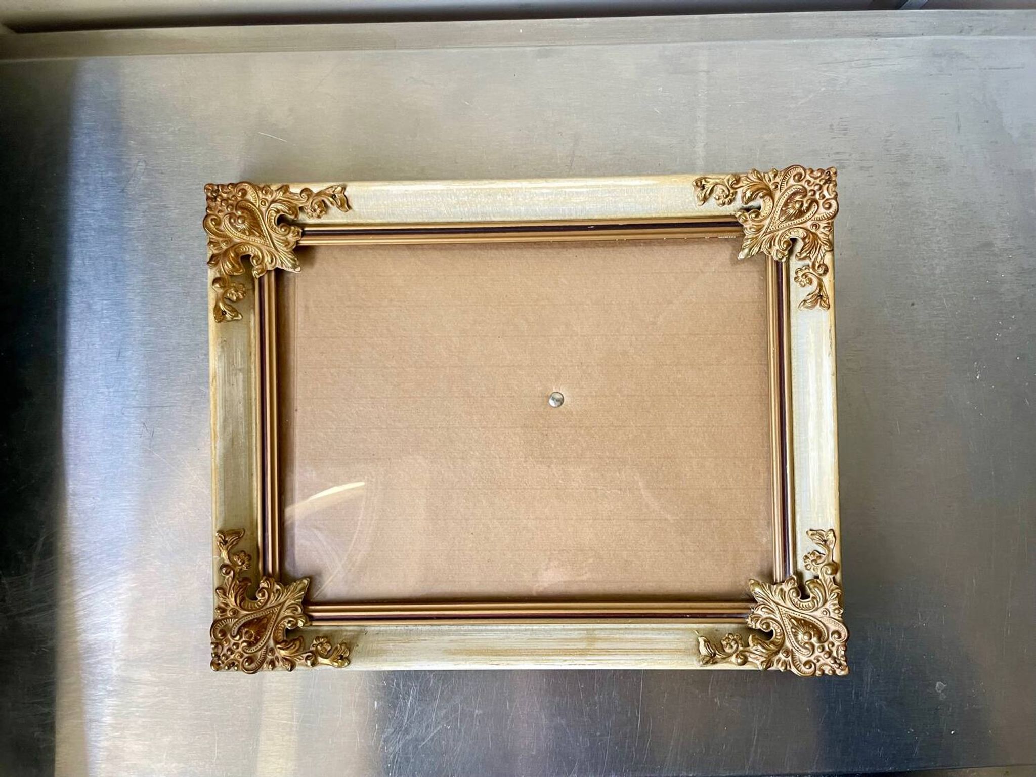 Antique wooden frame with metal gold colored details 28 cm x 22 cm convex glass