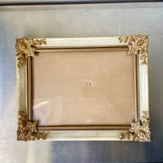 Antique wooden frame with metal gold colored details 28 cm x 22 cm convex glass