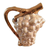 Pitcher of alpho grape cluster