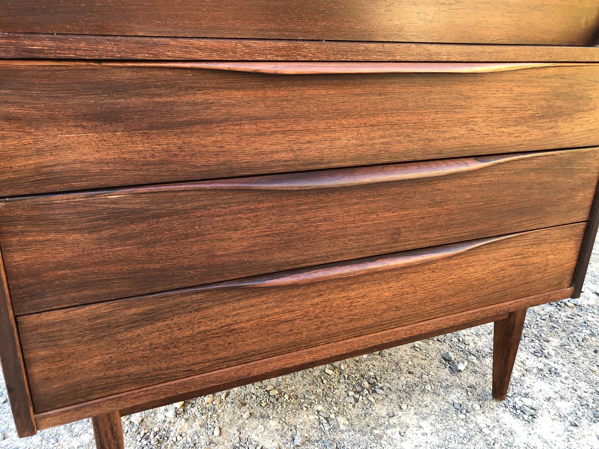 Vintage Scandinavian secretary in rosewood with drawers featuring fin-style handles.