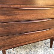 Vintage Scandinavian secretary in rosewood with drawers featuring fin-style handles.
