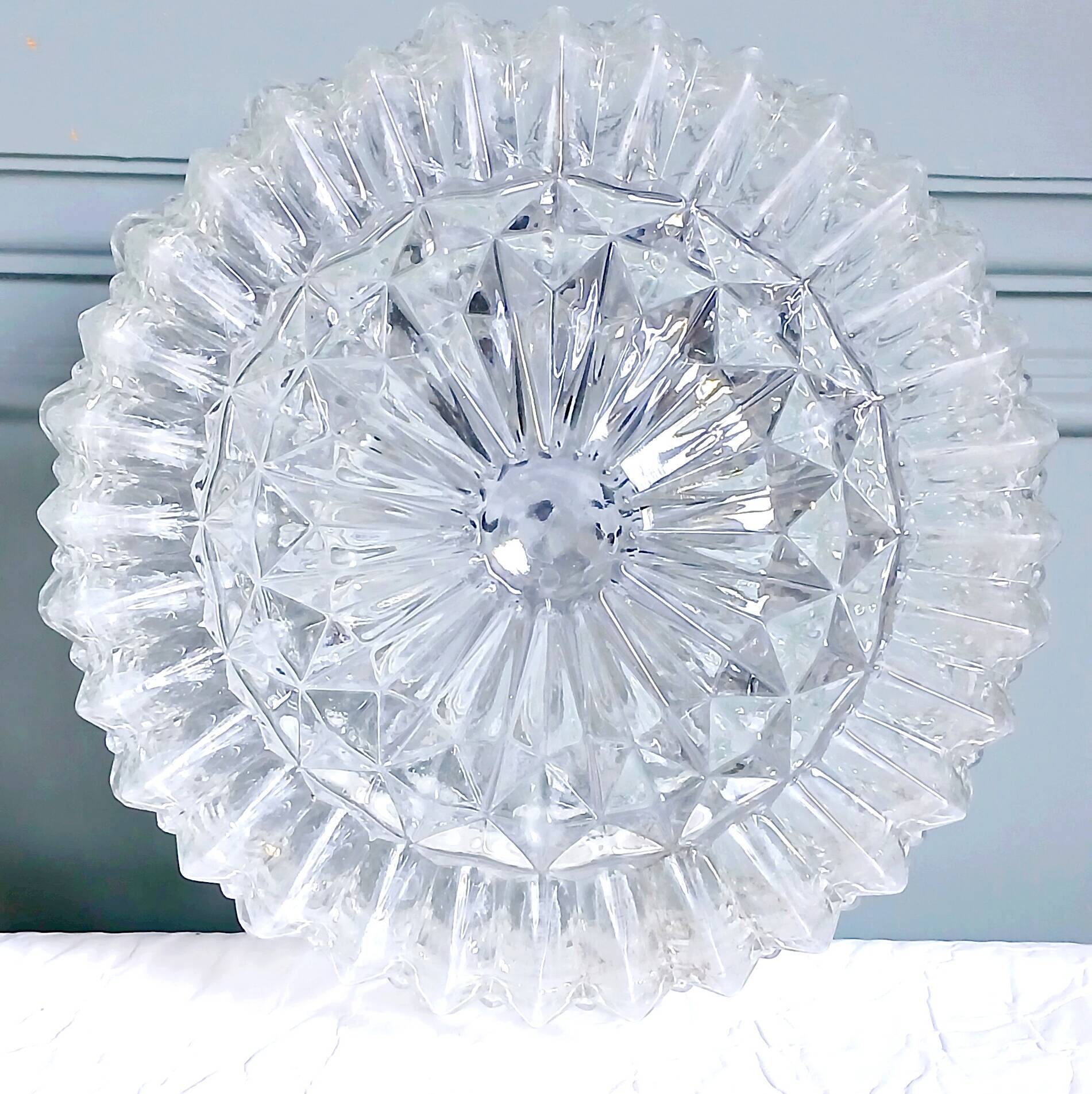Ceiling light or wall light in moulded glass with diamond point, 1970.