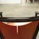 Table and 6 armchairs Baumann Diese, design Pagnon Pelhaître, Wenge color and red,