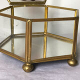 Glass box and hexagonal brass enamelled floral decoration