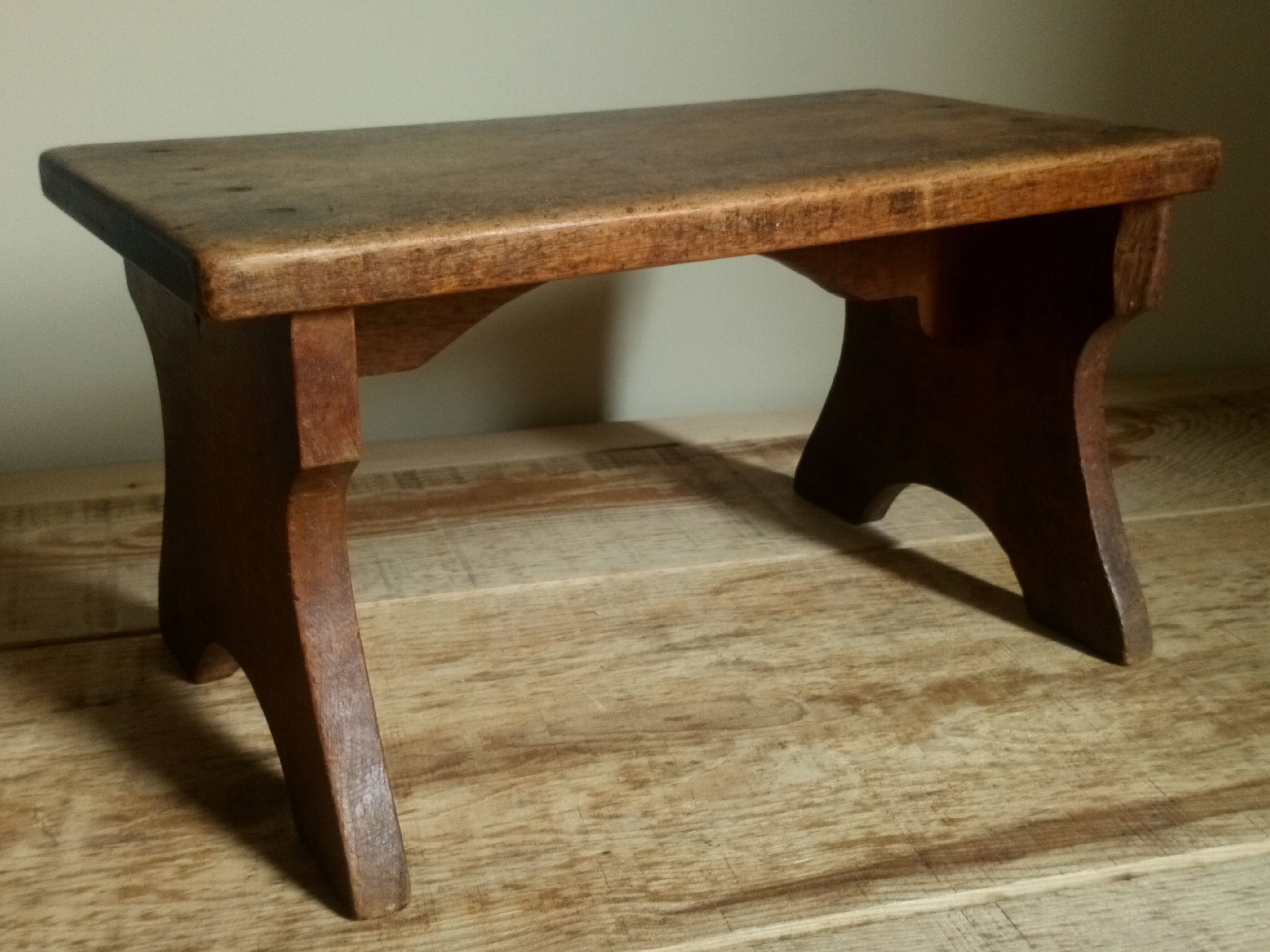 Old solid wood footring bench