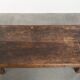 Table basse antique sud-européenne en bois fruitier avec un tiroir.
