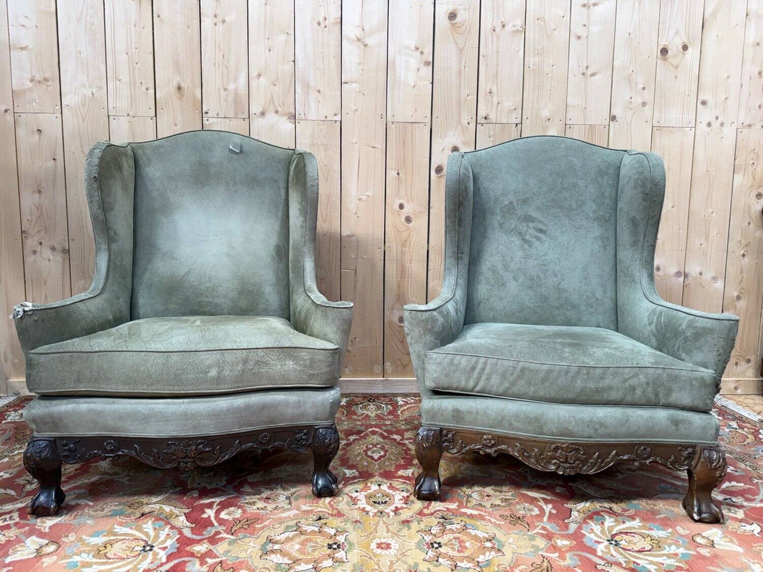 Pair of wingback armchairs in George III style – Carved wood – 18th century.