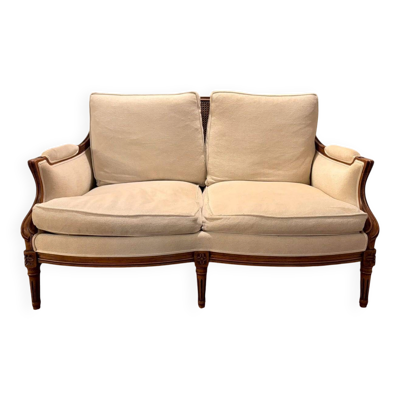 Canapé 2 places Roche Bobois de style Louis XVI — bois sculpté, côtés canné