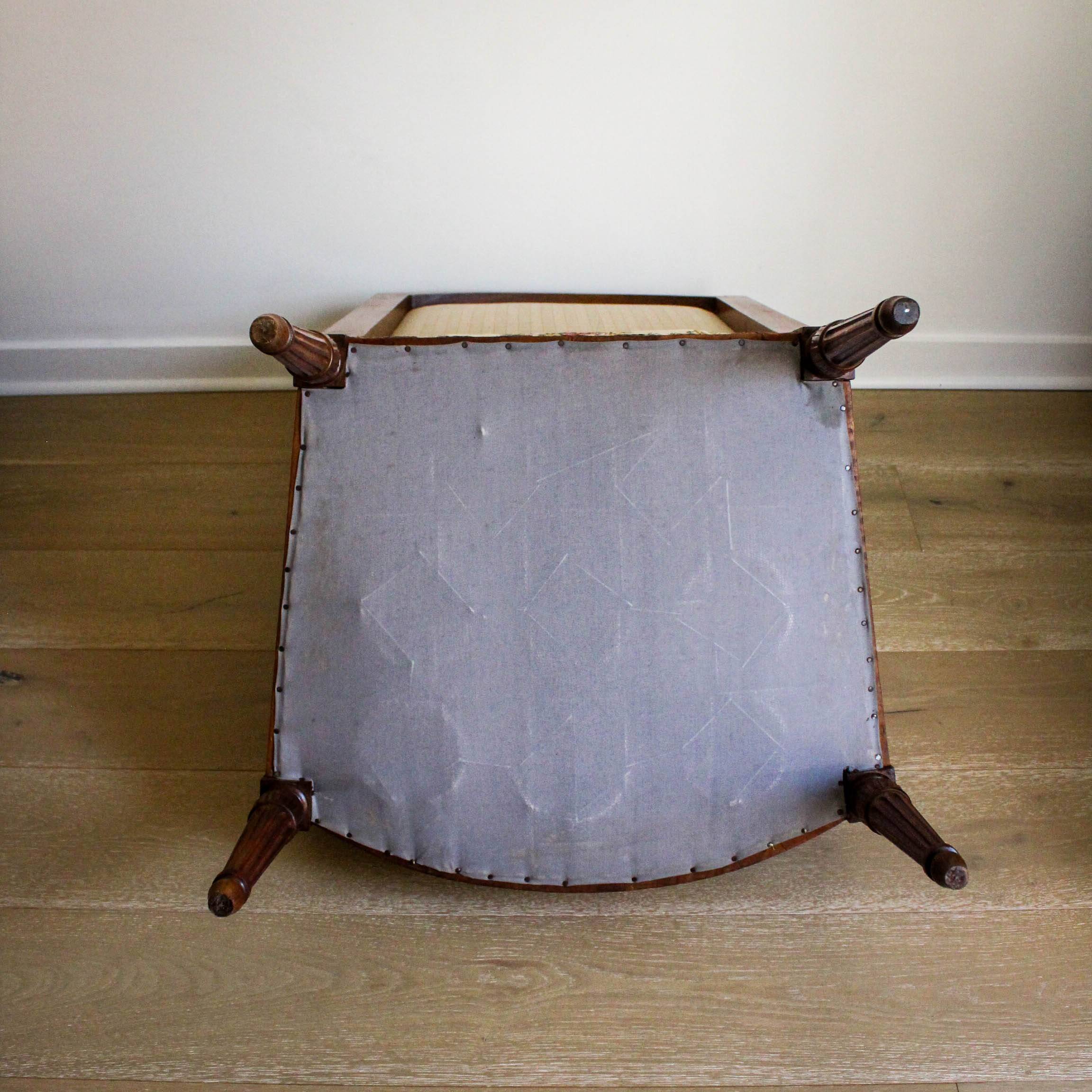 Louis XVI style carved armchair