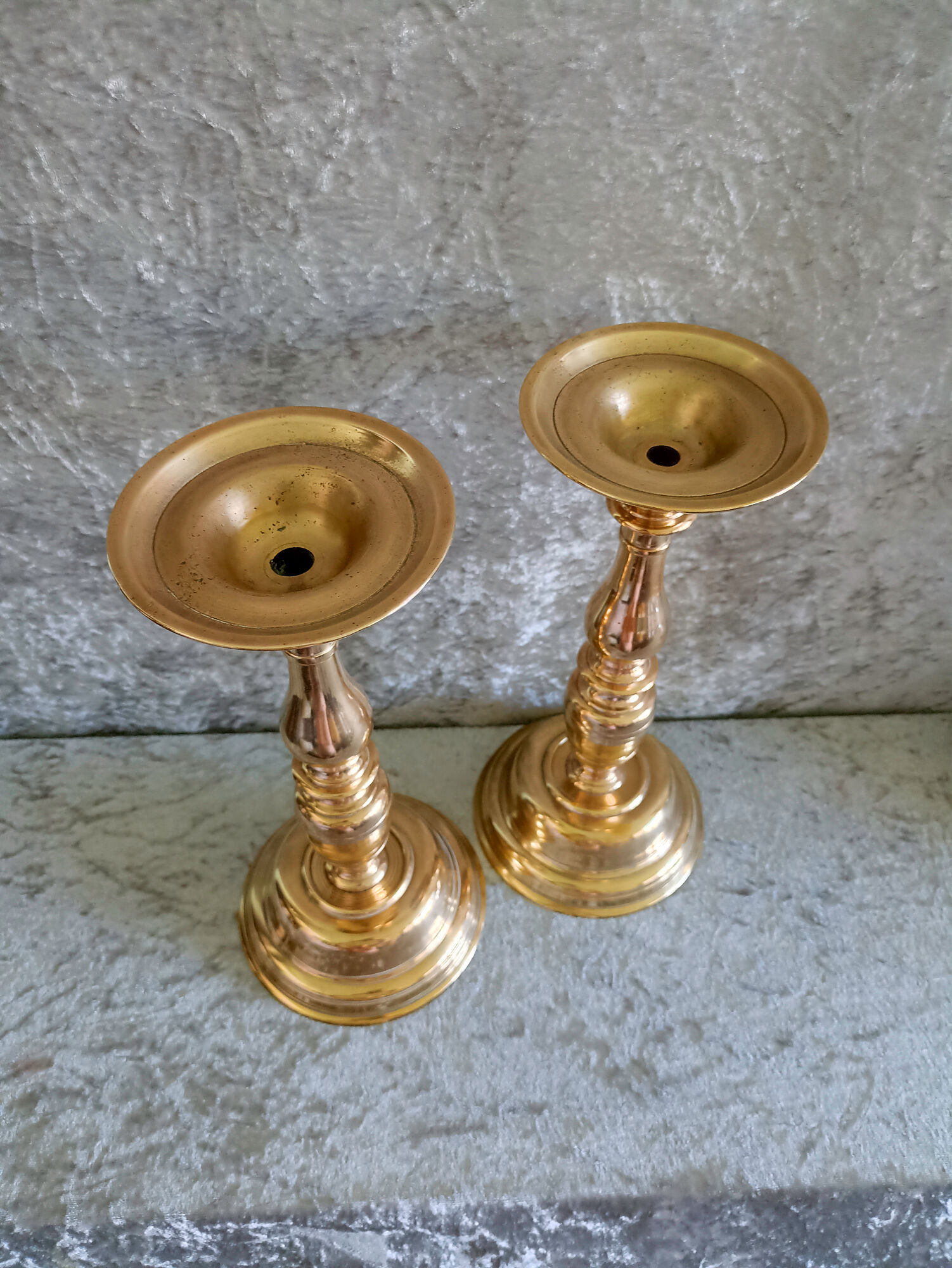 Pair of very large gilded bronze candlesticks