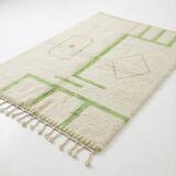 Moroccan rug in Azilal green tone.