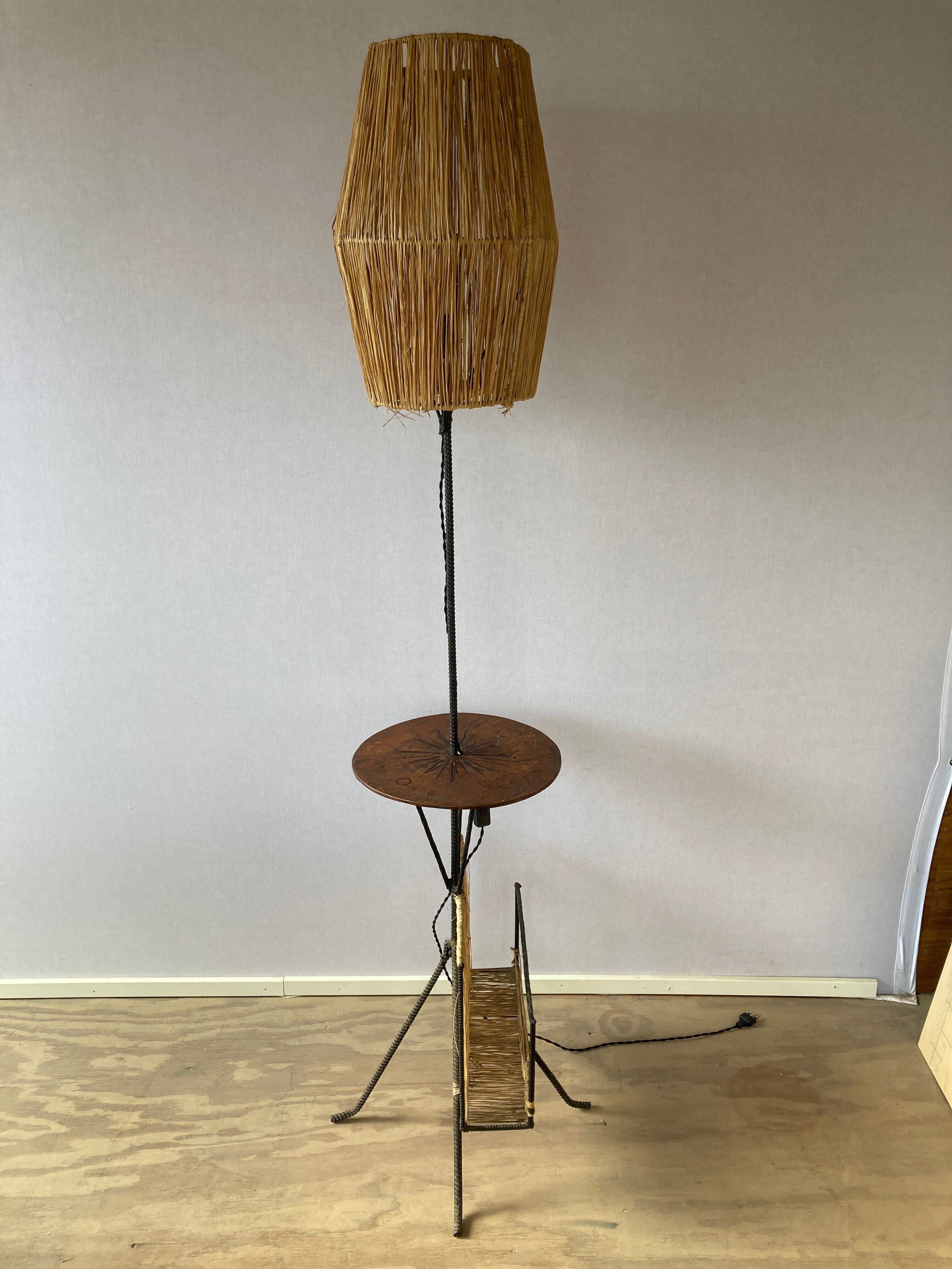 Wrought iron floor lamp with magazine holder and sisal shade, 1950s