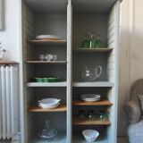 Vintage furniture transformed into a bookcase, verdigris patinated sideboard.