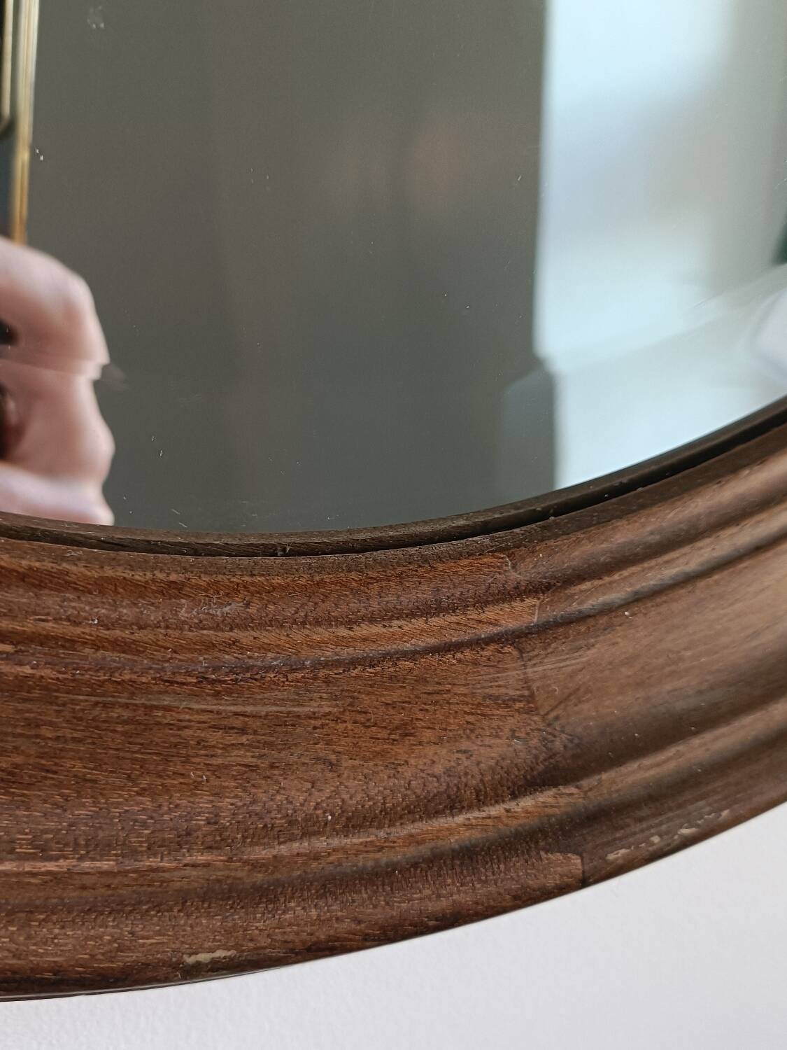 Antique oval beveled mirror