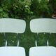 Pair of pale yellow formica chairs