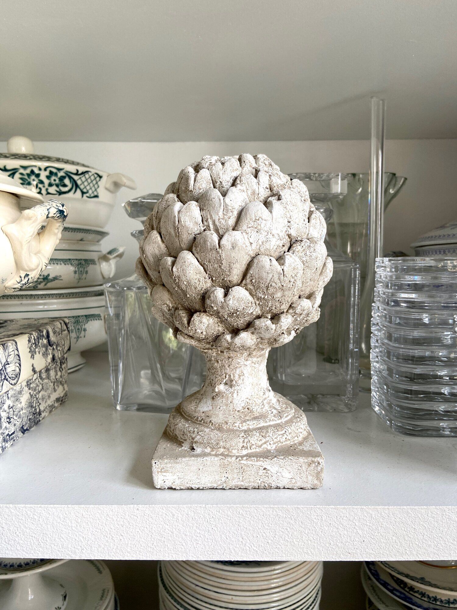 Ornamental artichokes in bleached concrete