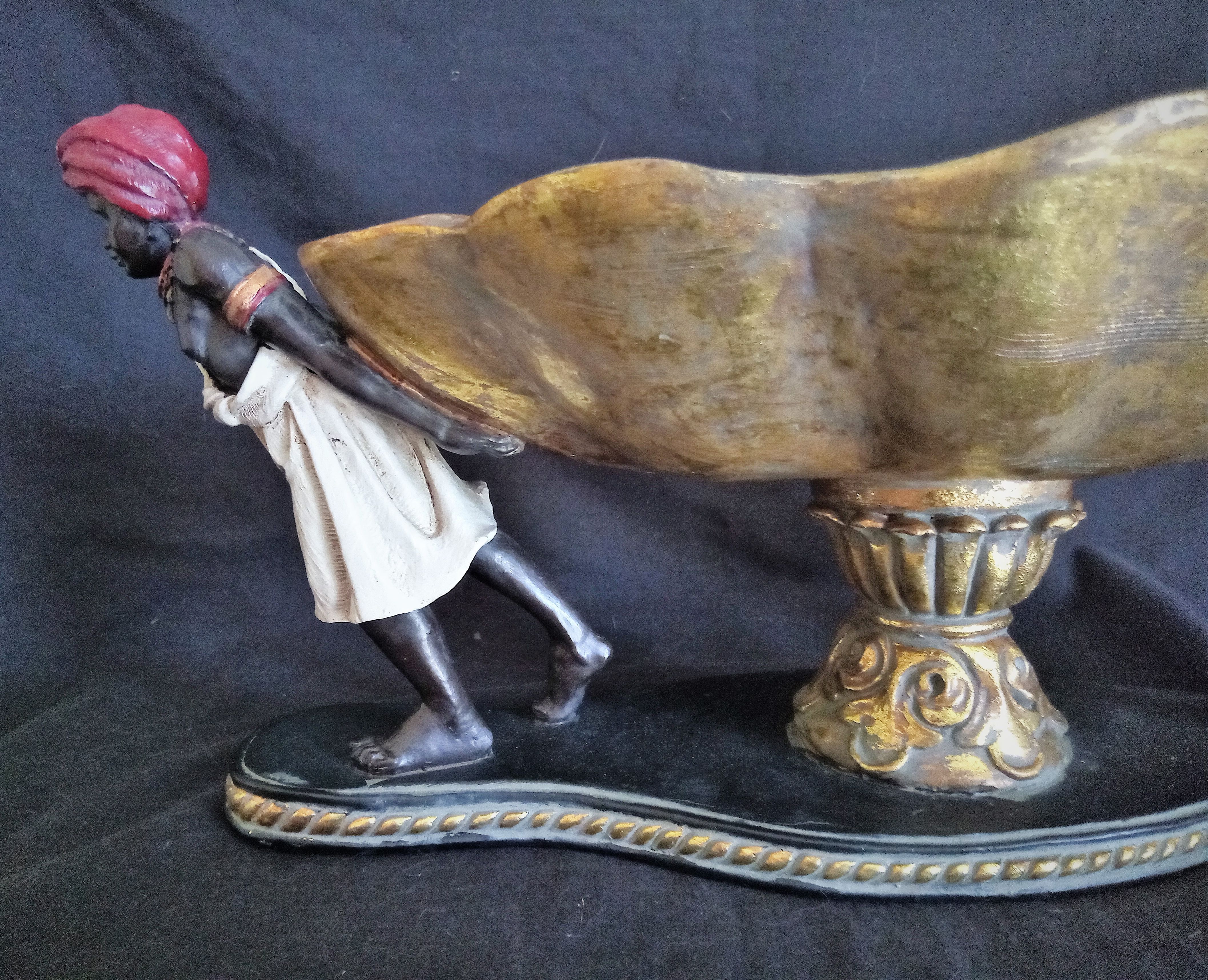 Centerpiece with African characters, plaster, resin and wood