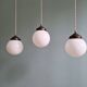 Art Deco trio of suspensions in white opaline, 1930s