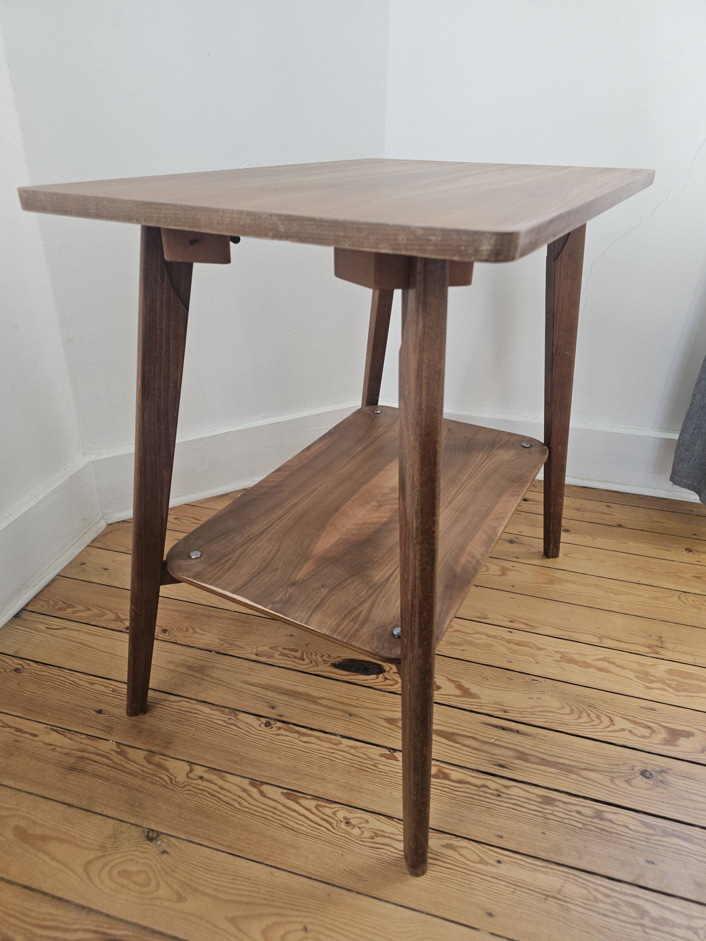 Vintage side table with double top in Scandinavian style.