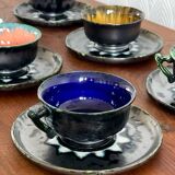 6 tasses en faïence de Quimper.