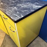 Vintage yellow sideboard, and black marble top.