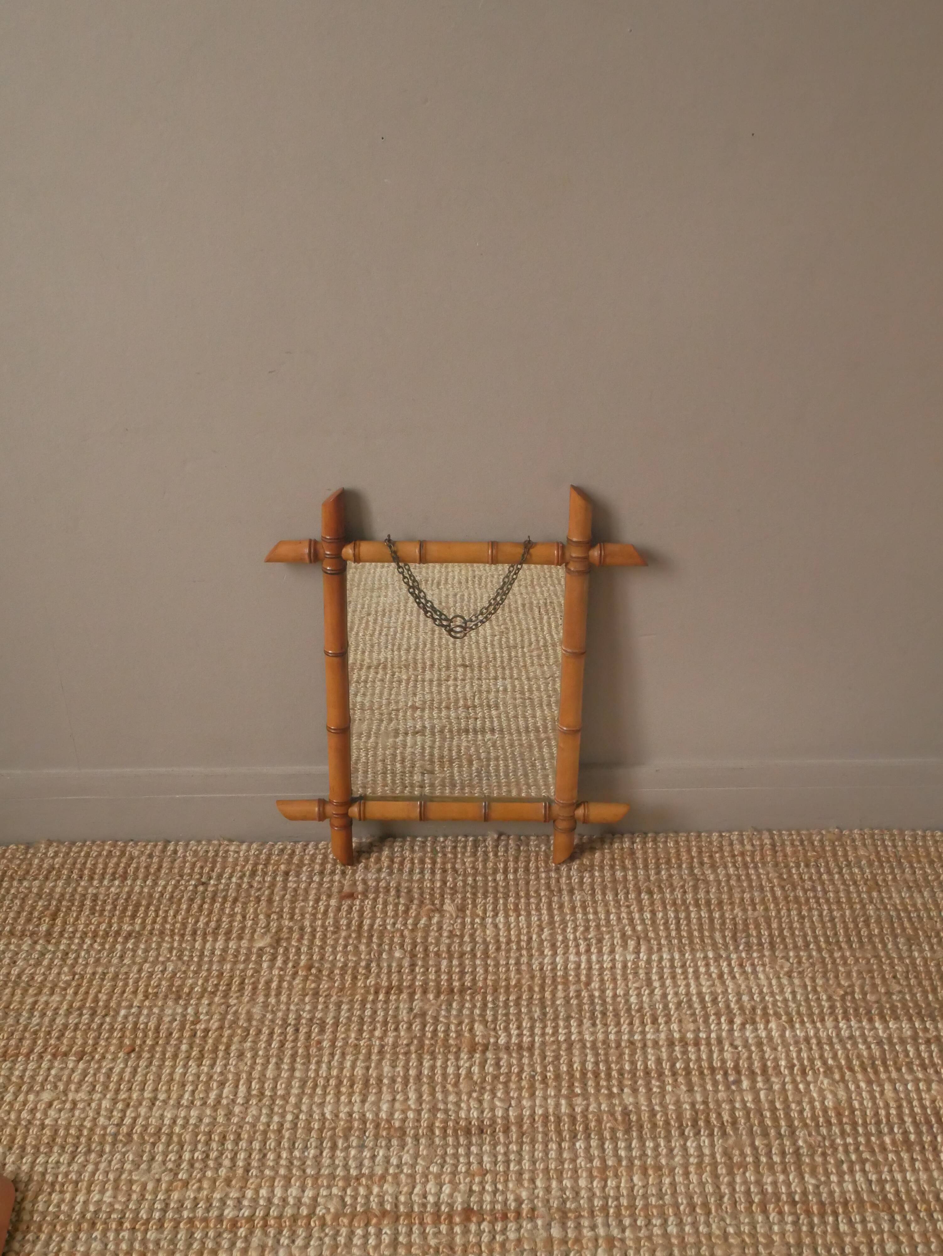 Vintage bamboo wooden mirror with retro bohemian spirit