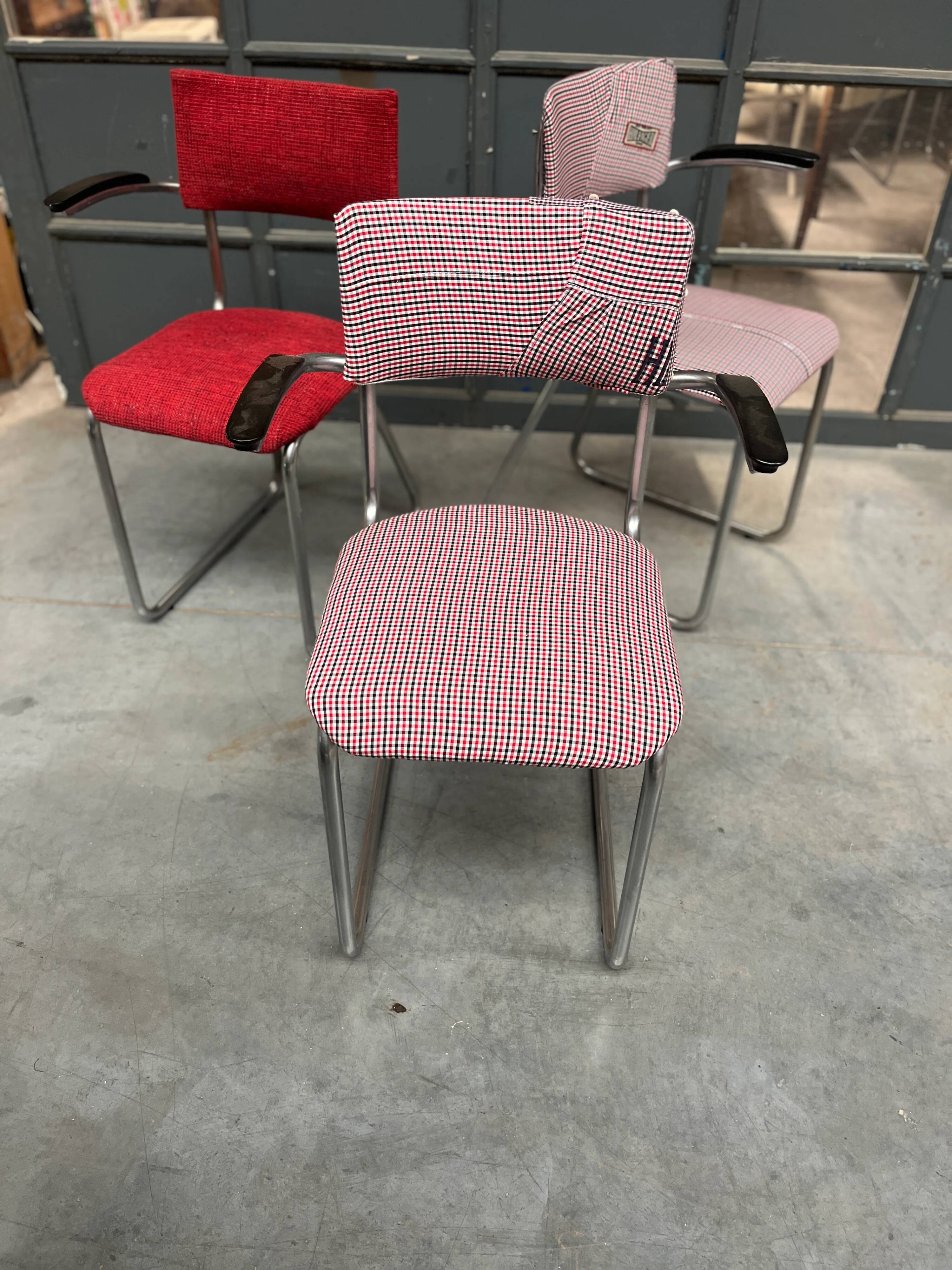 Set of 3 vintage cantilever chairs reupholstered.