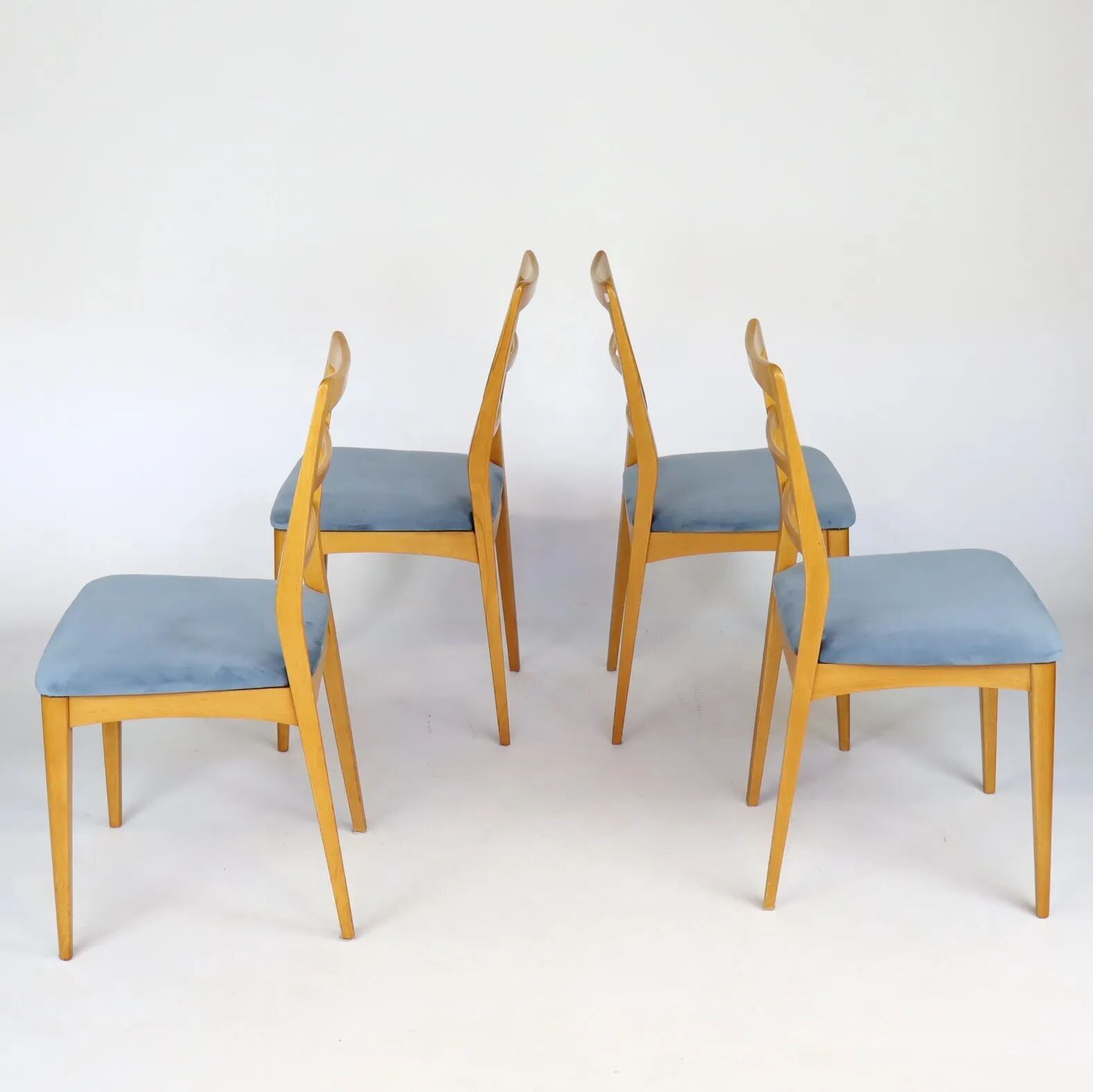 Set of four blue velvet Scandinavian chairs.