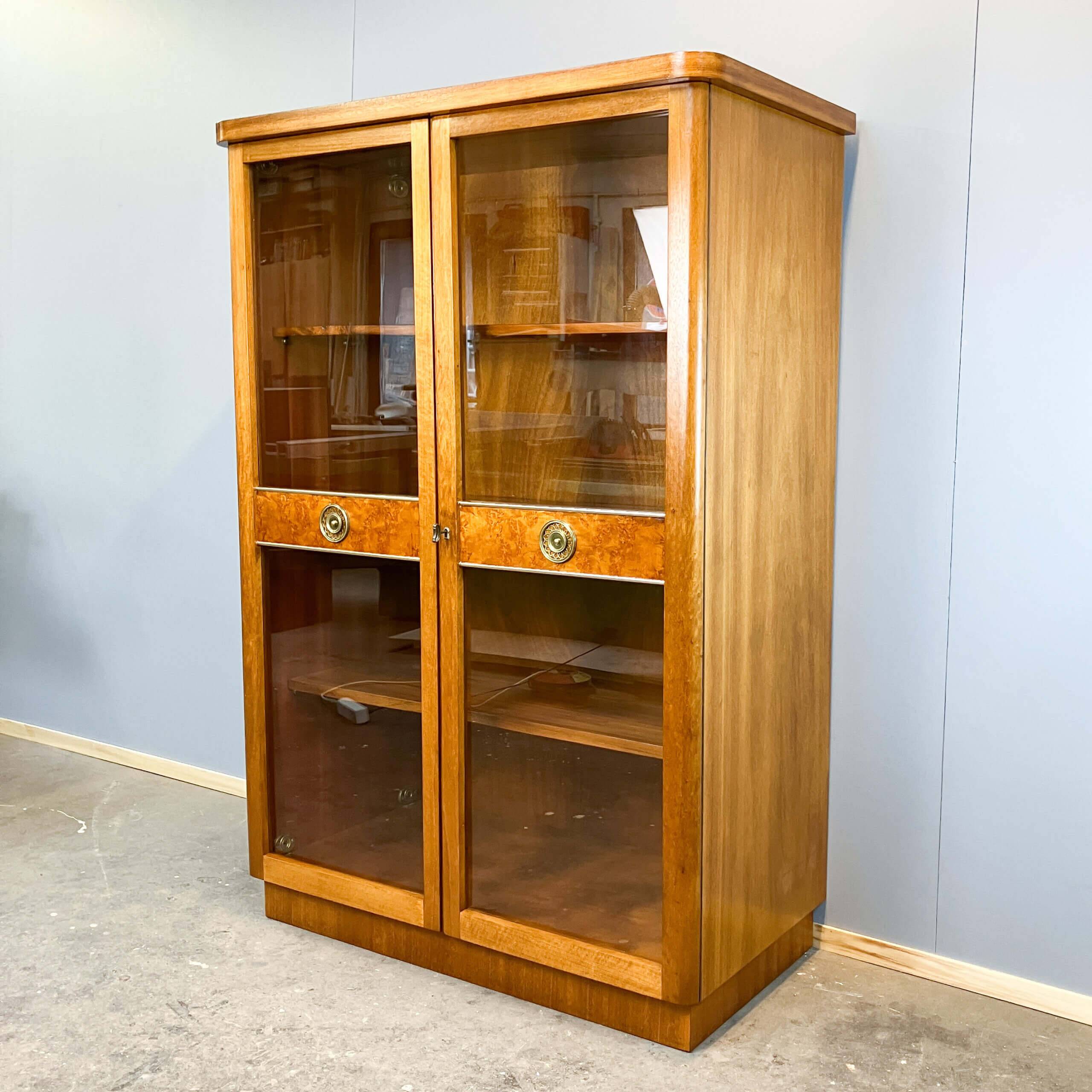 Art Deco cabinet with glass doors, various woods, 1930s