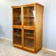 Art Deco cabinet with glass doors, various woods, 1930s