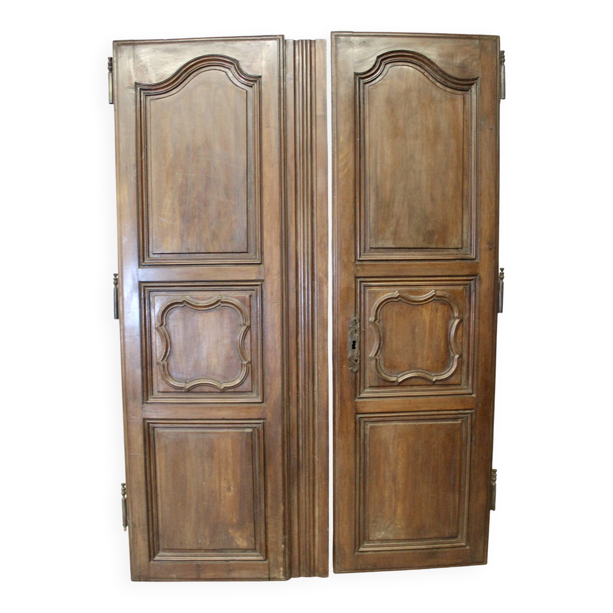 Pair of Louis XV walnut doors with medallion