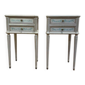 Paire de tables de chevets de style Louis XVI en bois peint