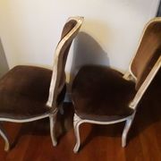 A pair of Louis XV style armchairs in wood and velvet fabrics