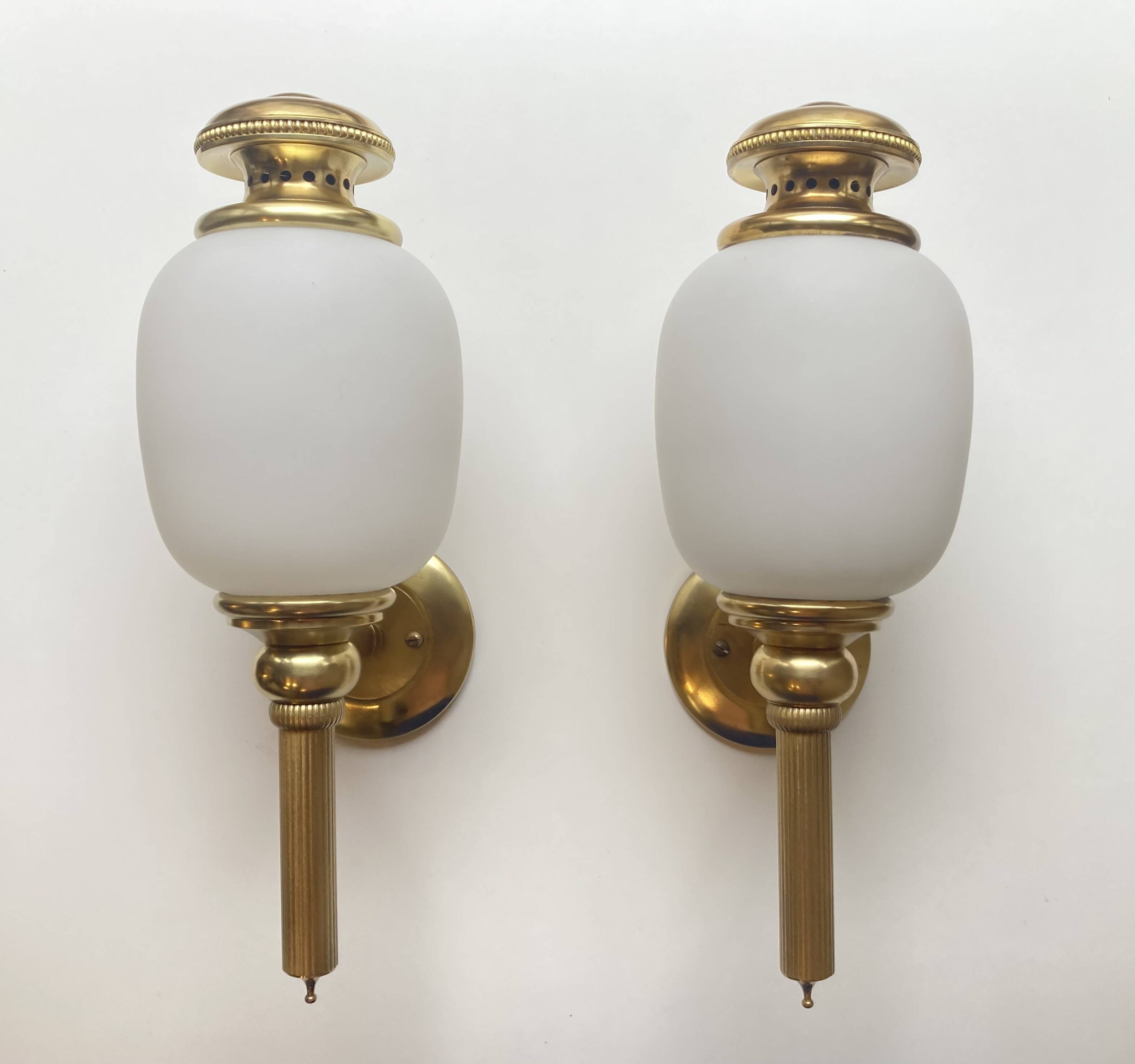 Set of two Sciolari wall lights.