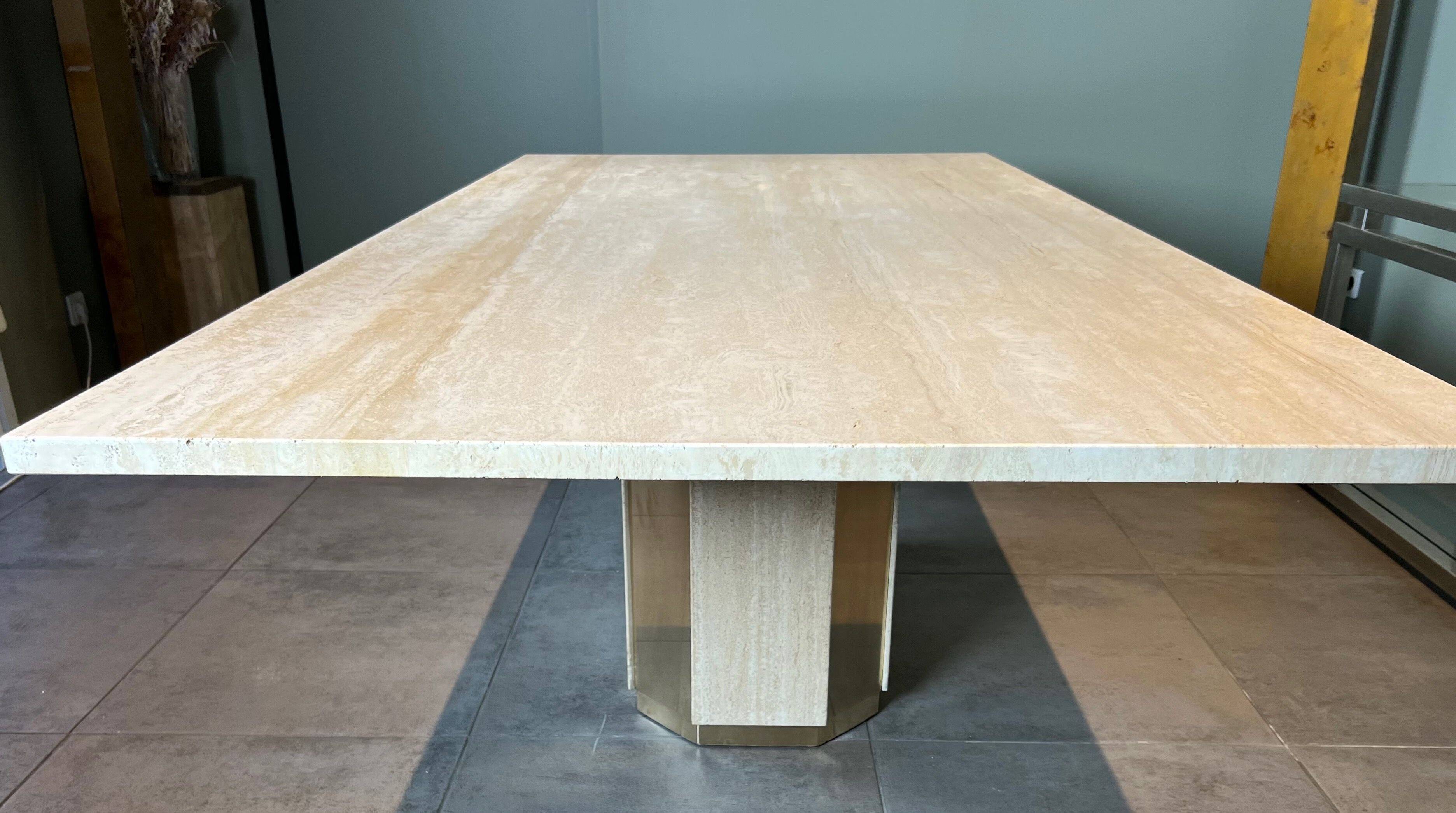Dining table in travertine and brass. French work. Around 1970.
