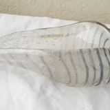 Shell pocket emptier