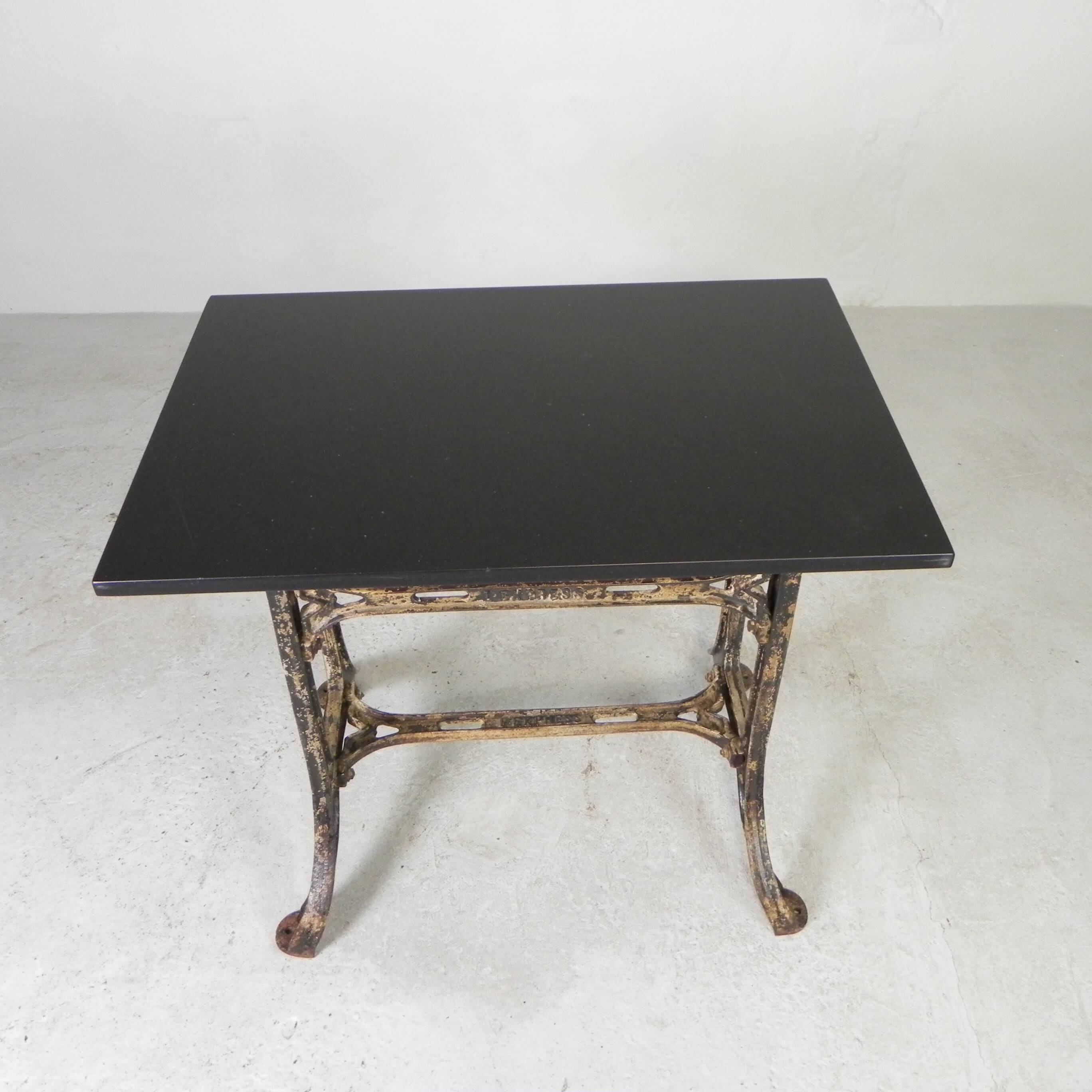 Industrial table, garden table with hard stone slab on cast iron frame, 1930s