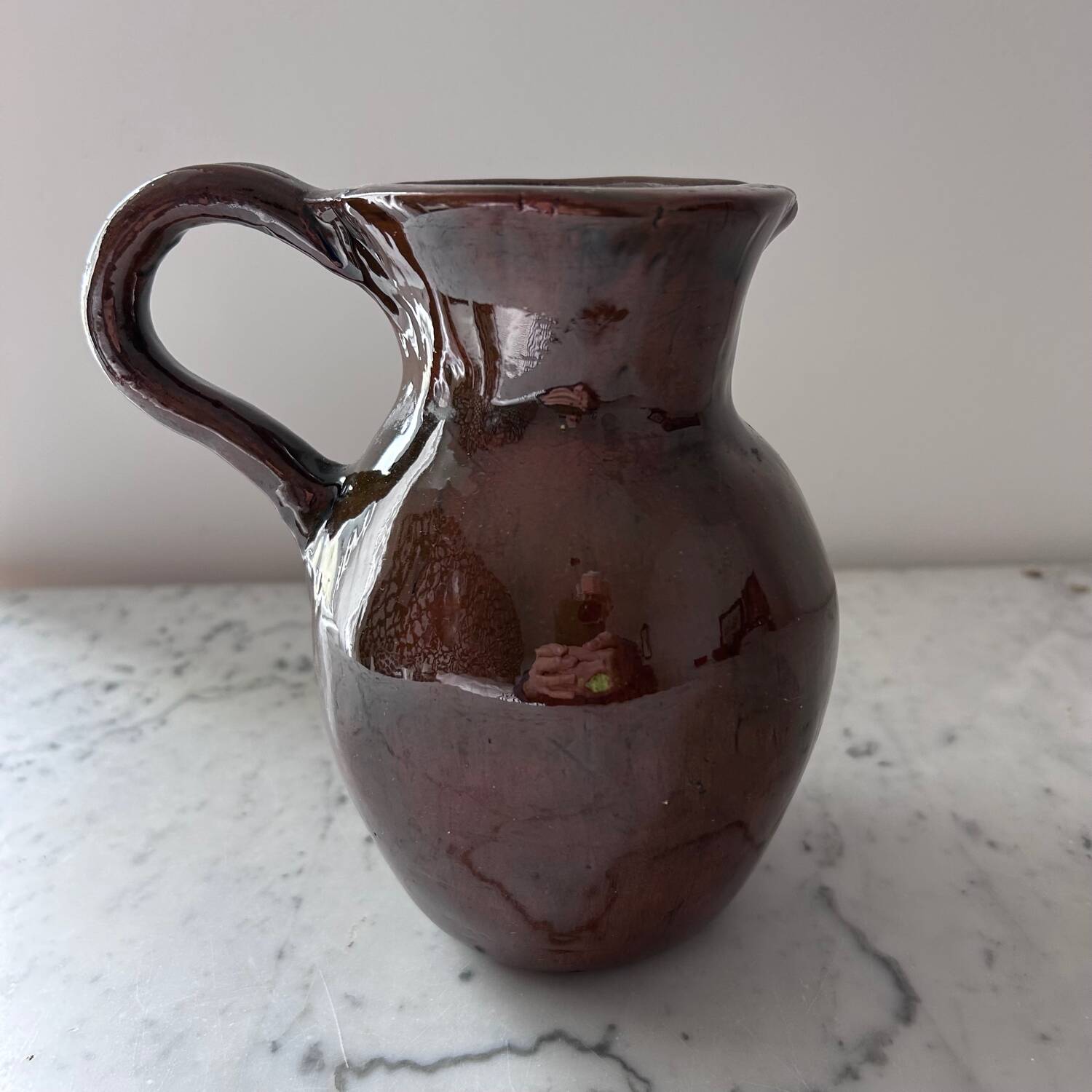 Old signed artisanal pitcher
