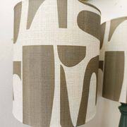 Pair of wooden lamps with custom modernist lampshades.