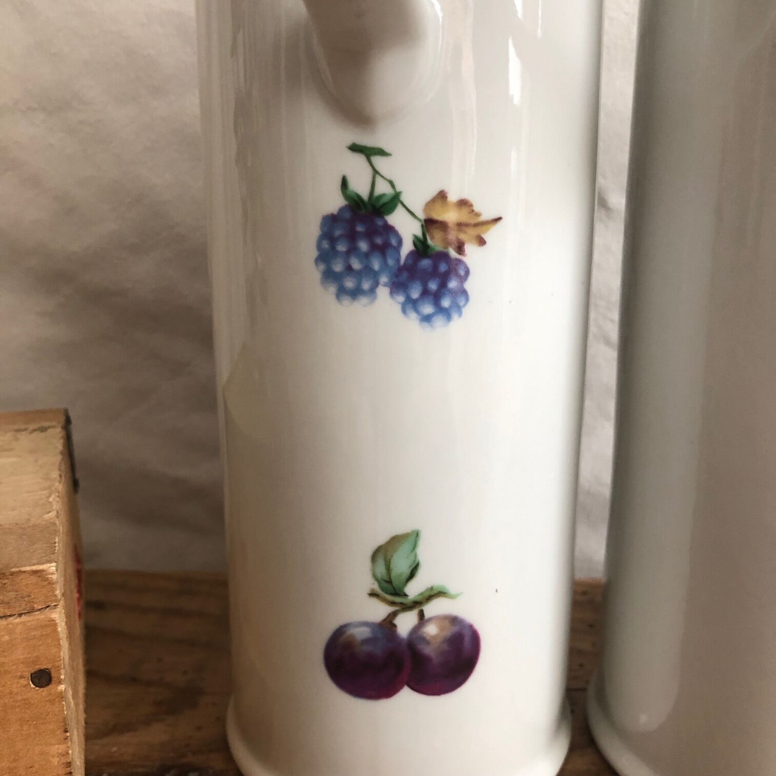Porcelain bottle duo for mirabelle and raspberry brandy