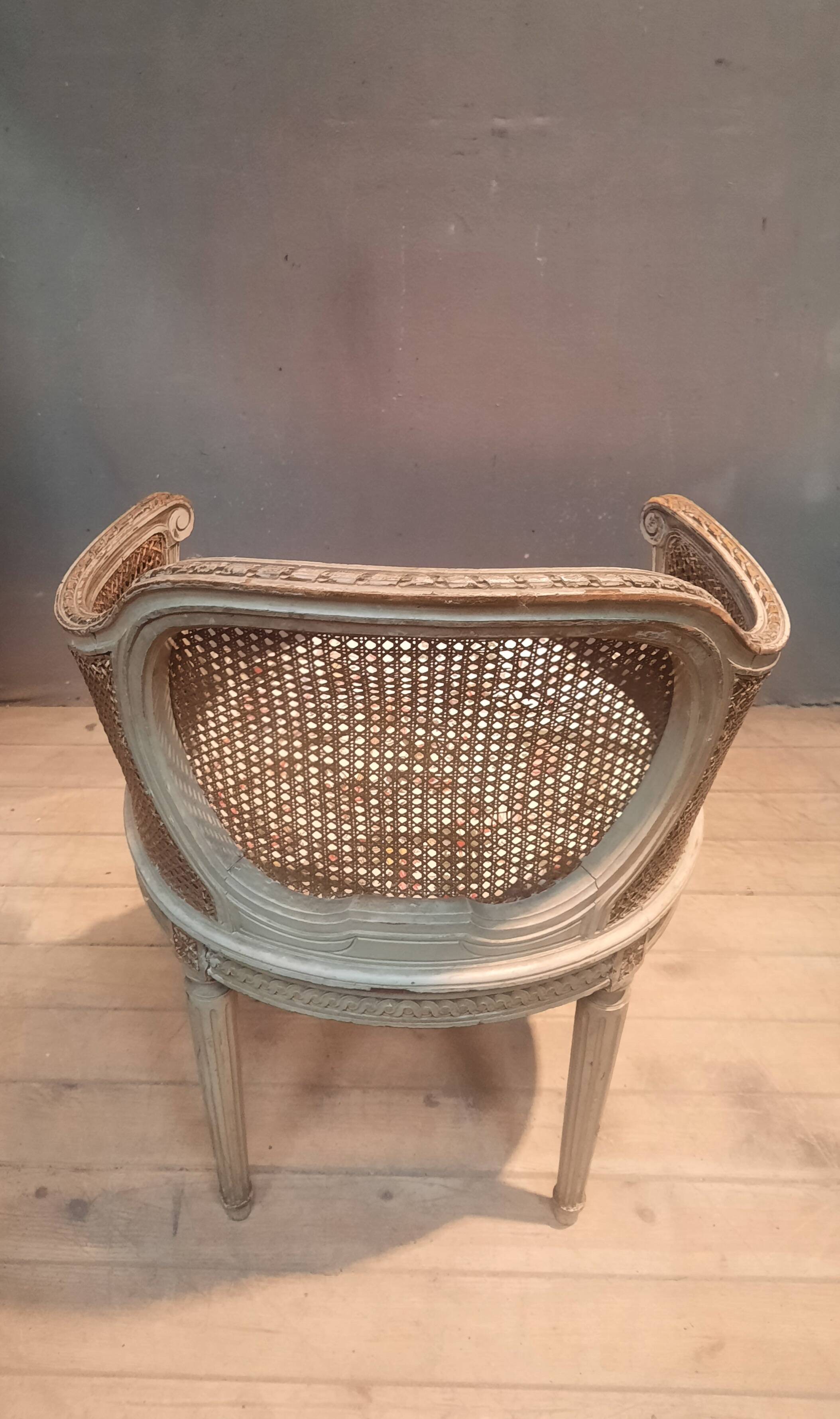 Caned armchair in Louis XVI style