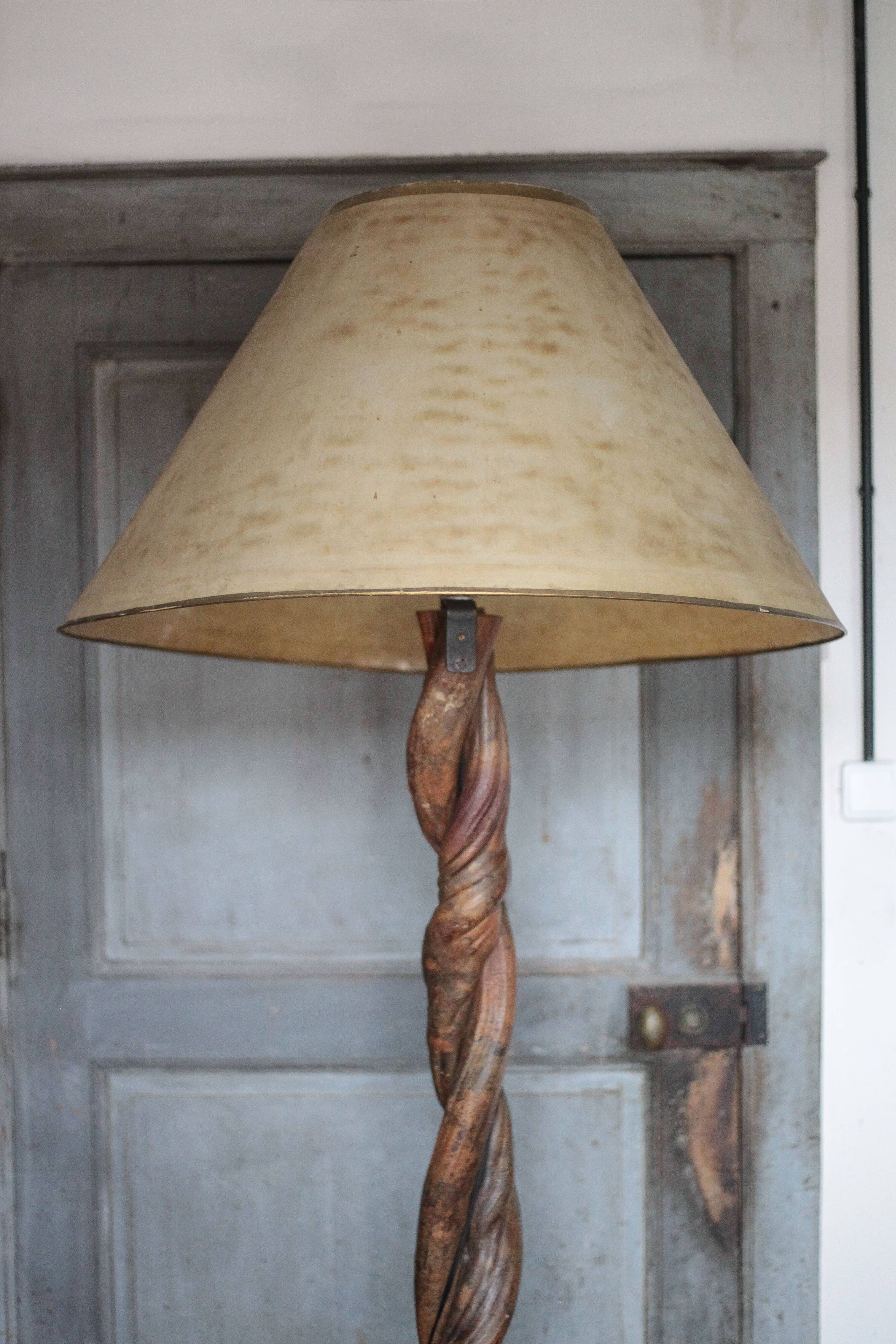 Liane and metal floor lamp with perforated leather shade featuring elephant patterns, lise.