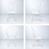 Chaise vintage en bois blanc avec dossier à barreaux, style maison de campagne