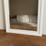 Late 19th century mirror with decorated pediment. 102x66.