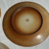 Set of 4 vintage stoneware plates, including 2 with floral motifs