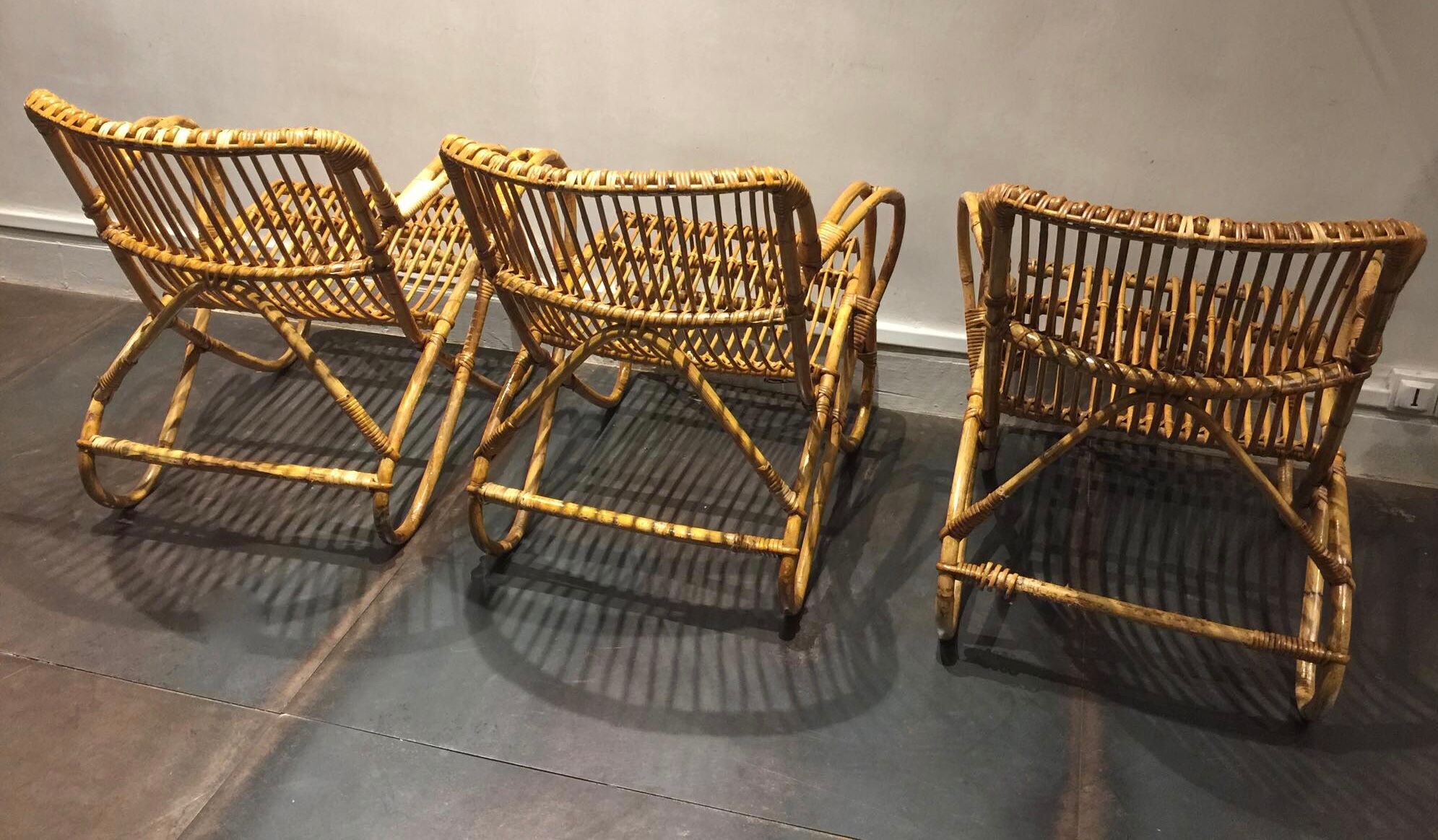 Set de trois fauteuils en rotin
