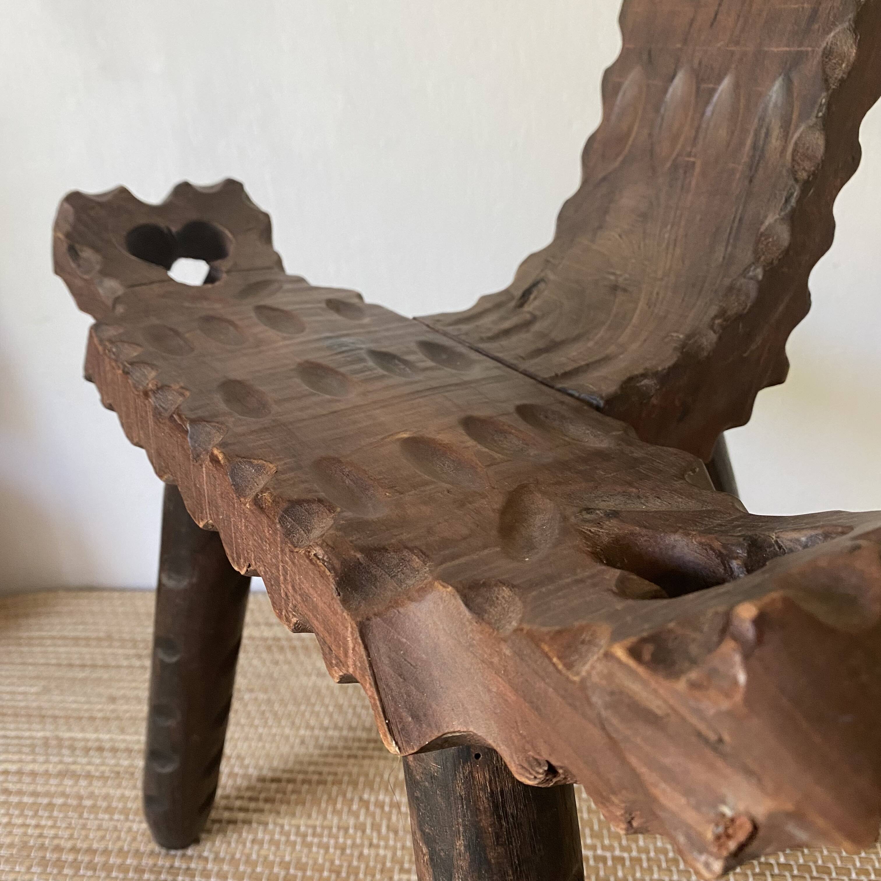 Vintage Spanish tripod chair in carved wood