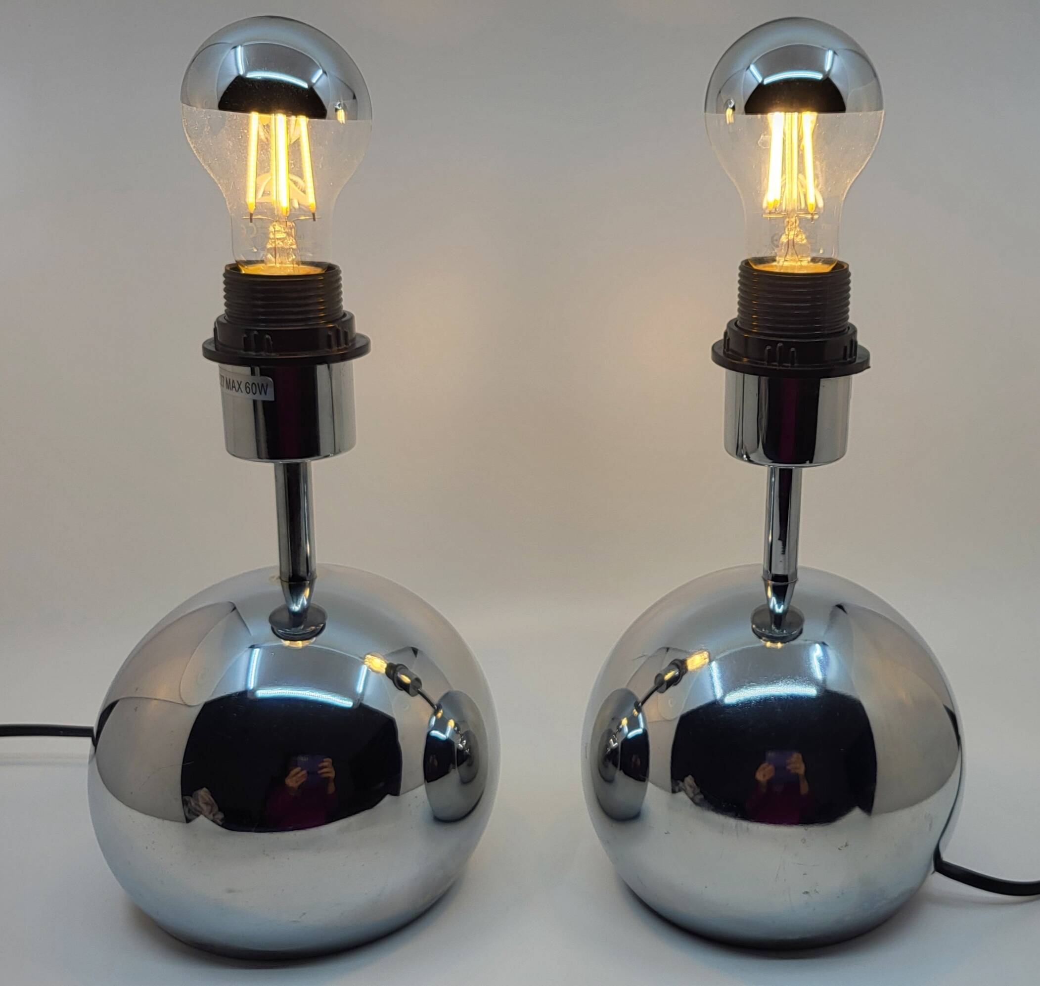 Pair of ball lamps, to be placed in chrome-plated stainless steel Vintage